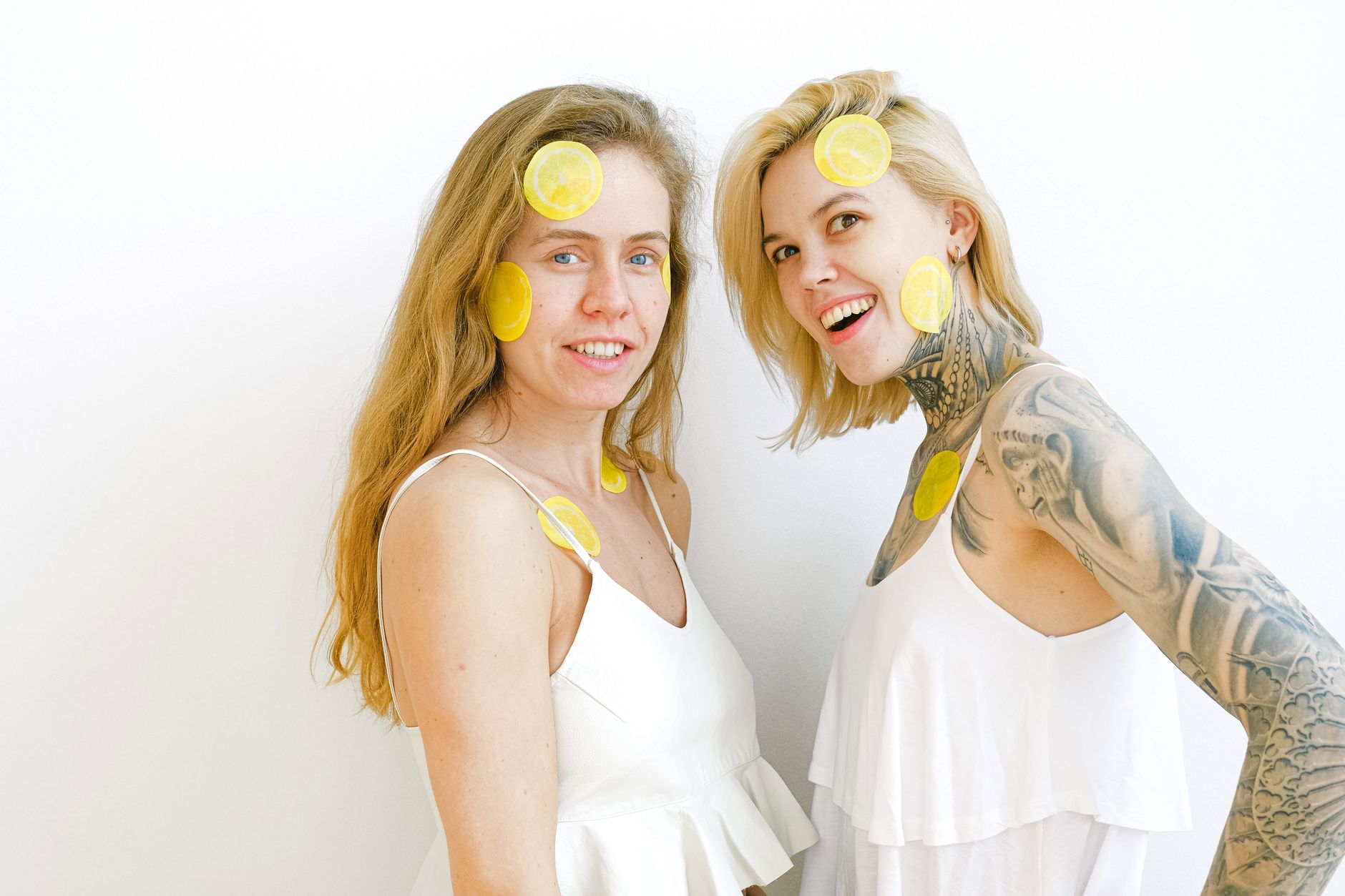 Women laughing together, celebrating joy and connection after healing
